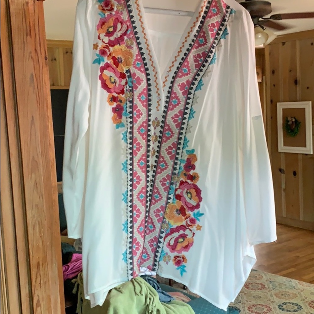 White blouse with embroidery.